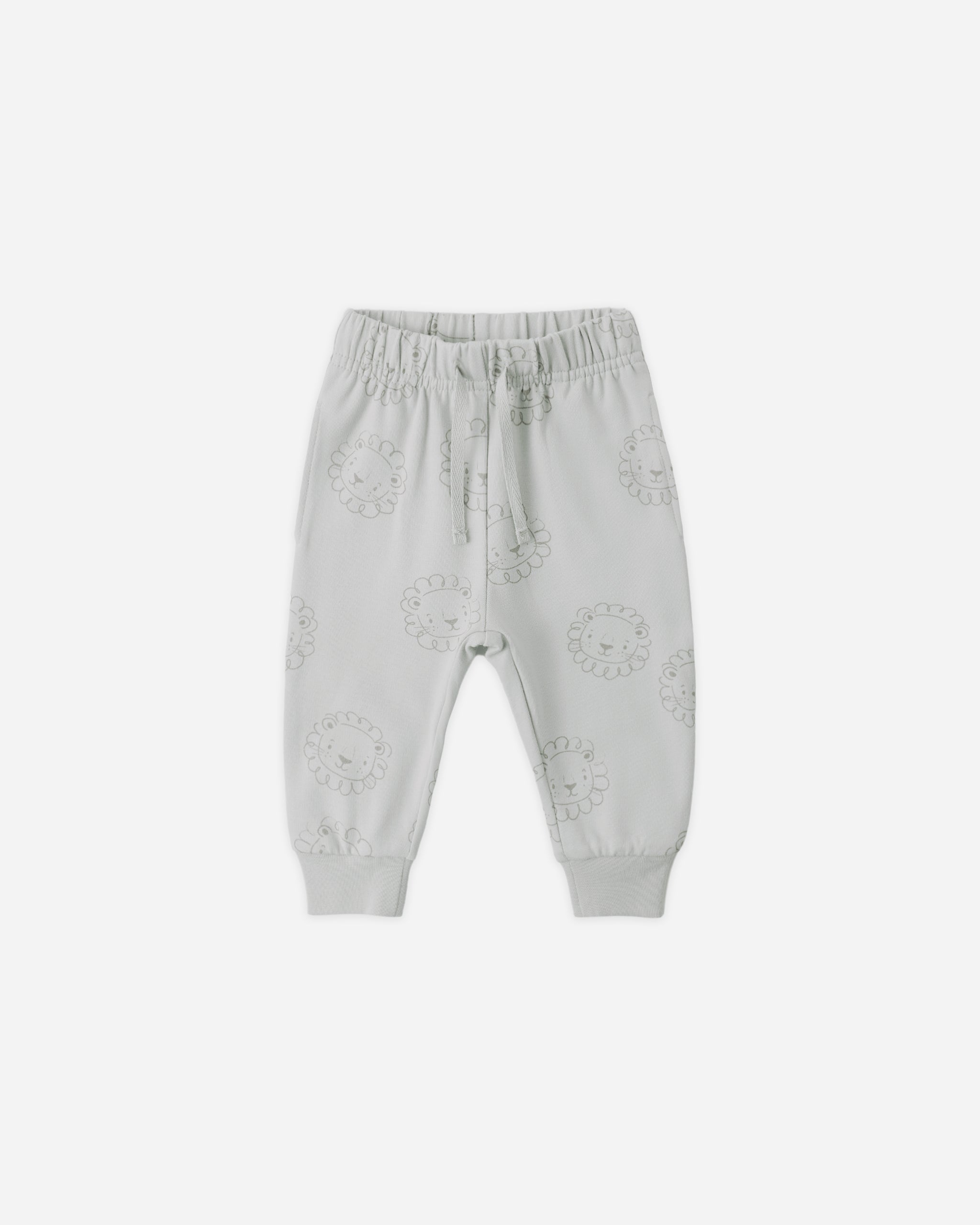 Light gray baby pants with floral patterns on a white background