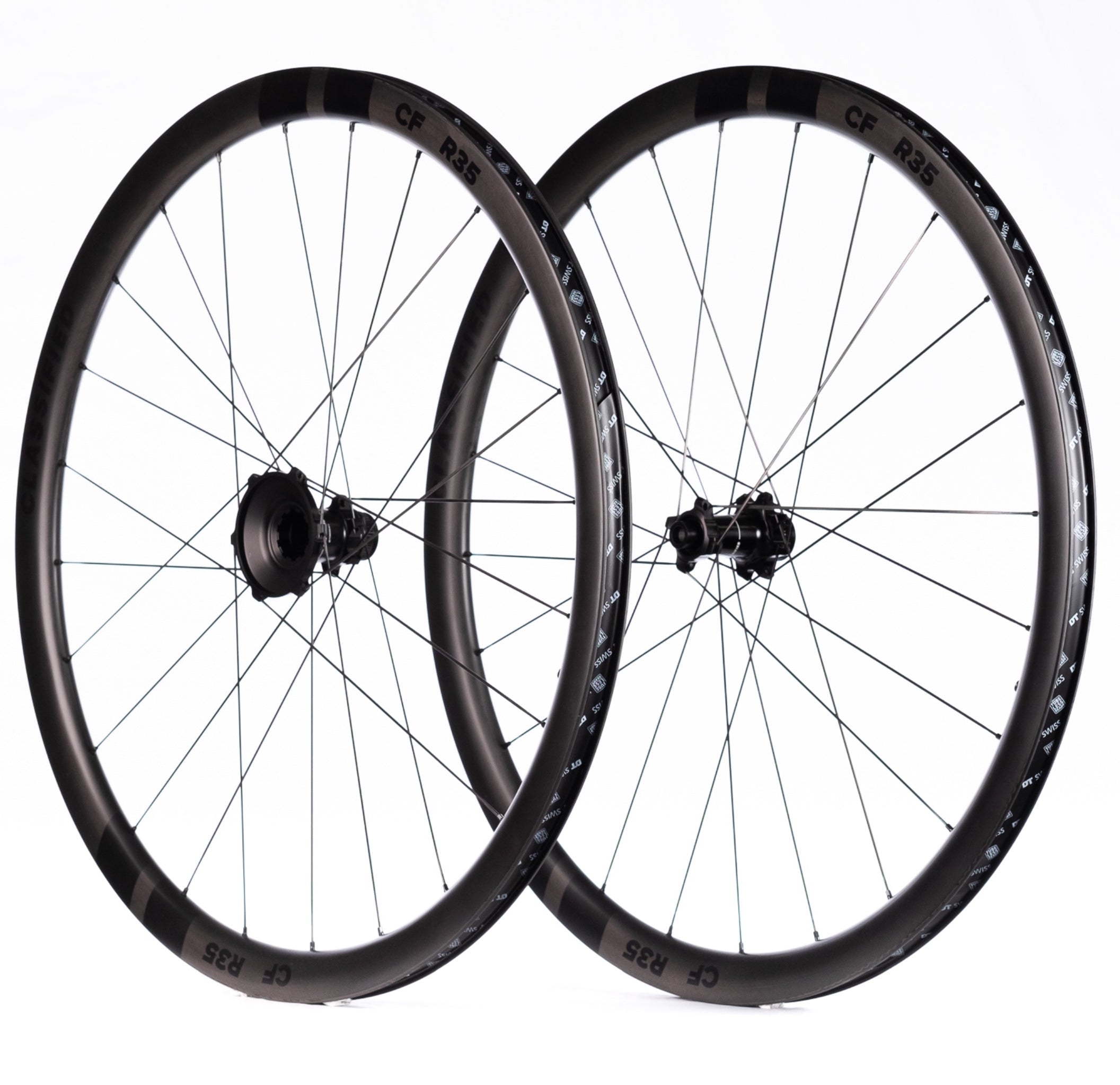 Pair of black bicycle wheels on a white background