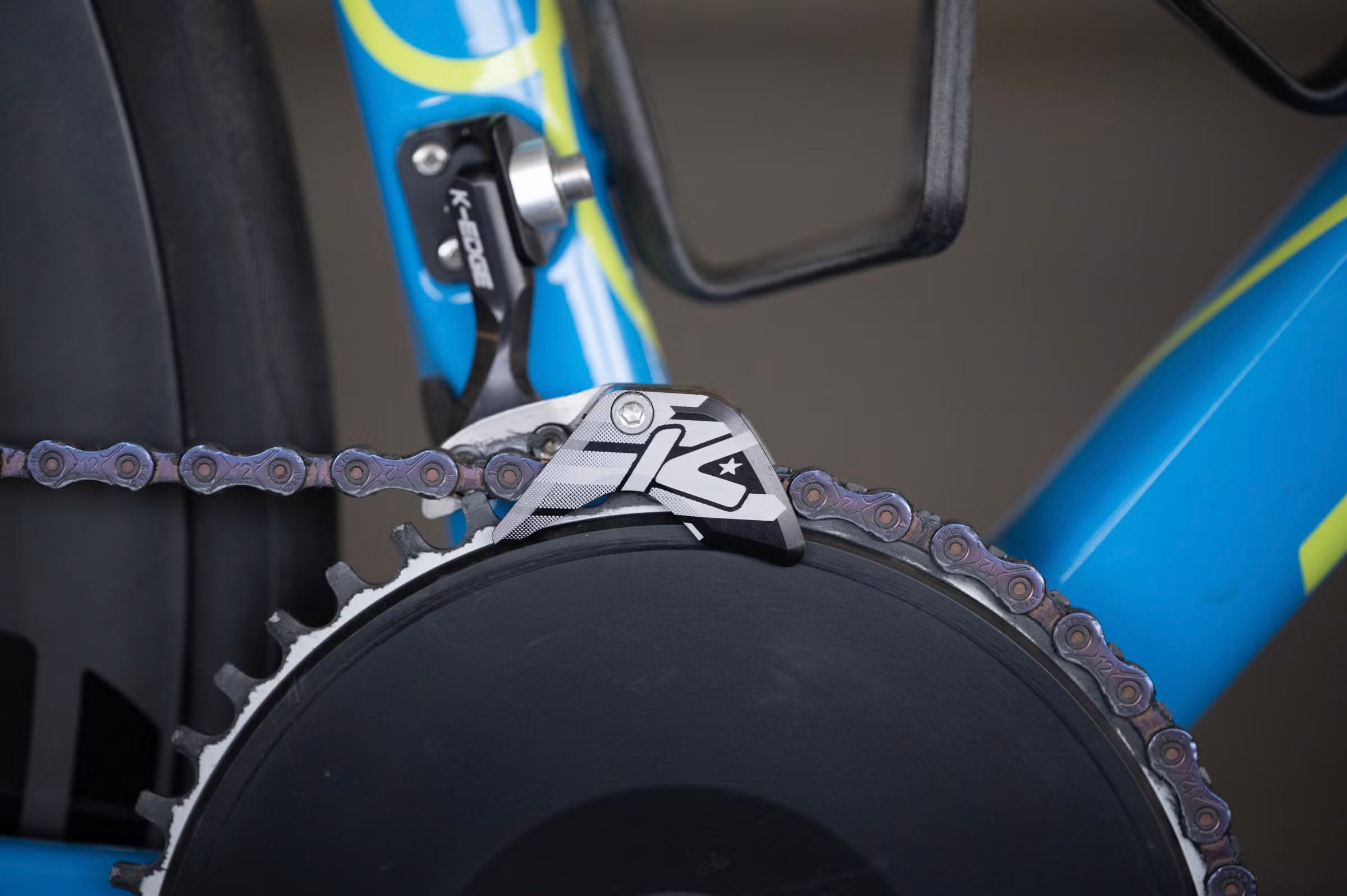 Close-up of a bicycle with TRP chain and gear system with a blurred background