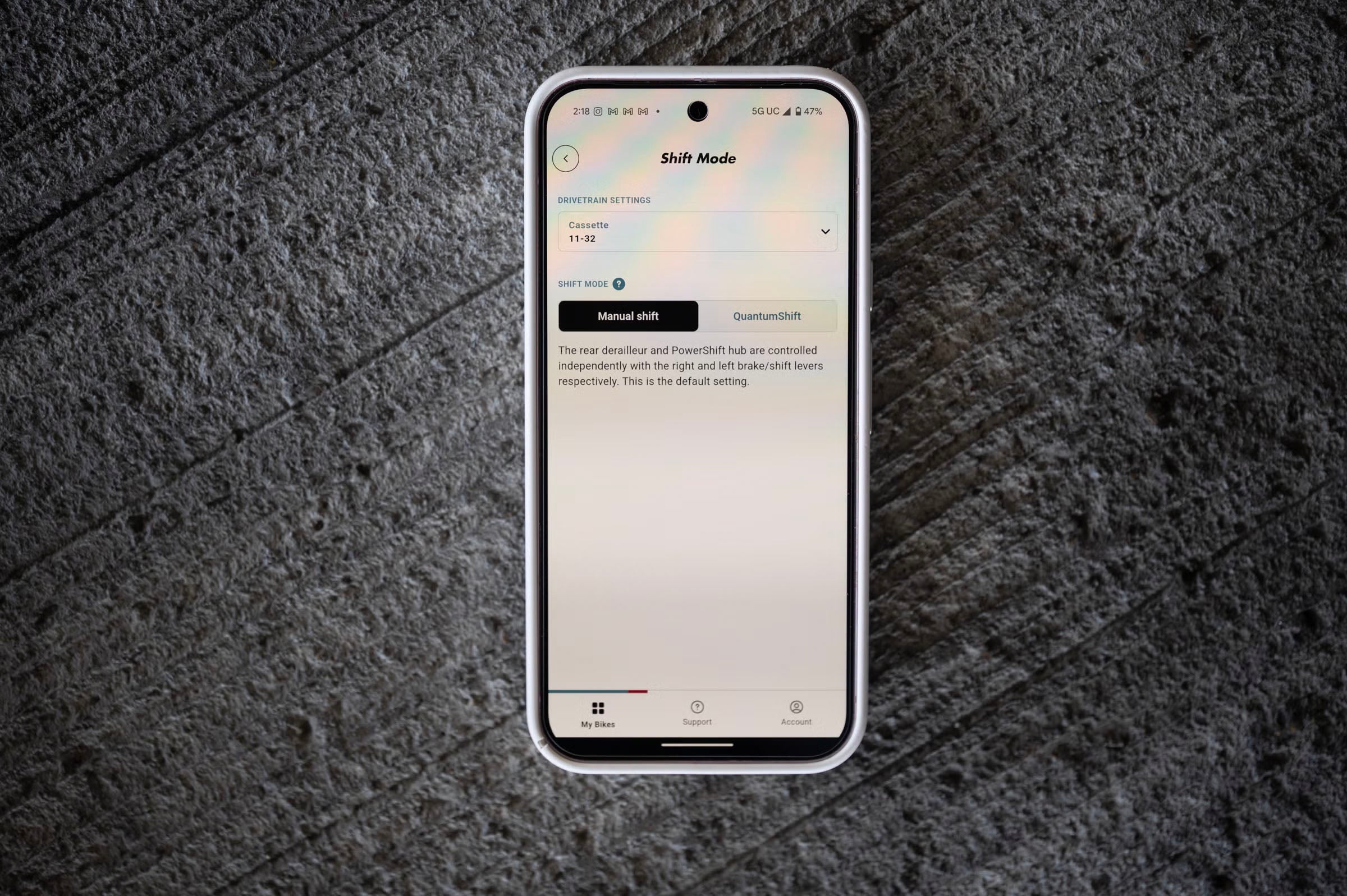 Smartphone displaying a the VISTAR App screen on a textured surface