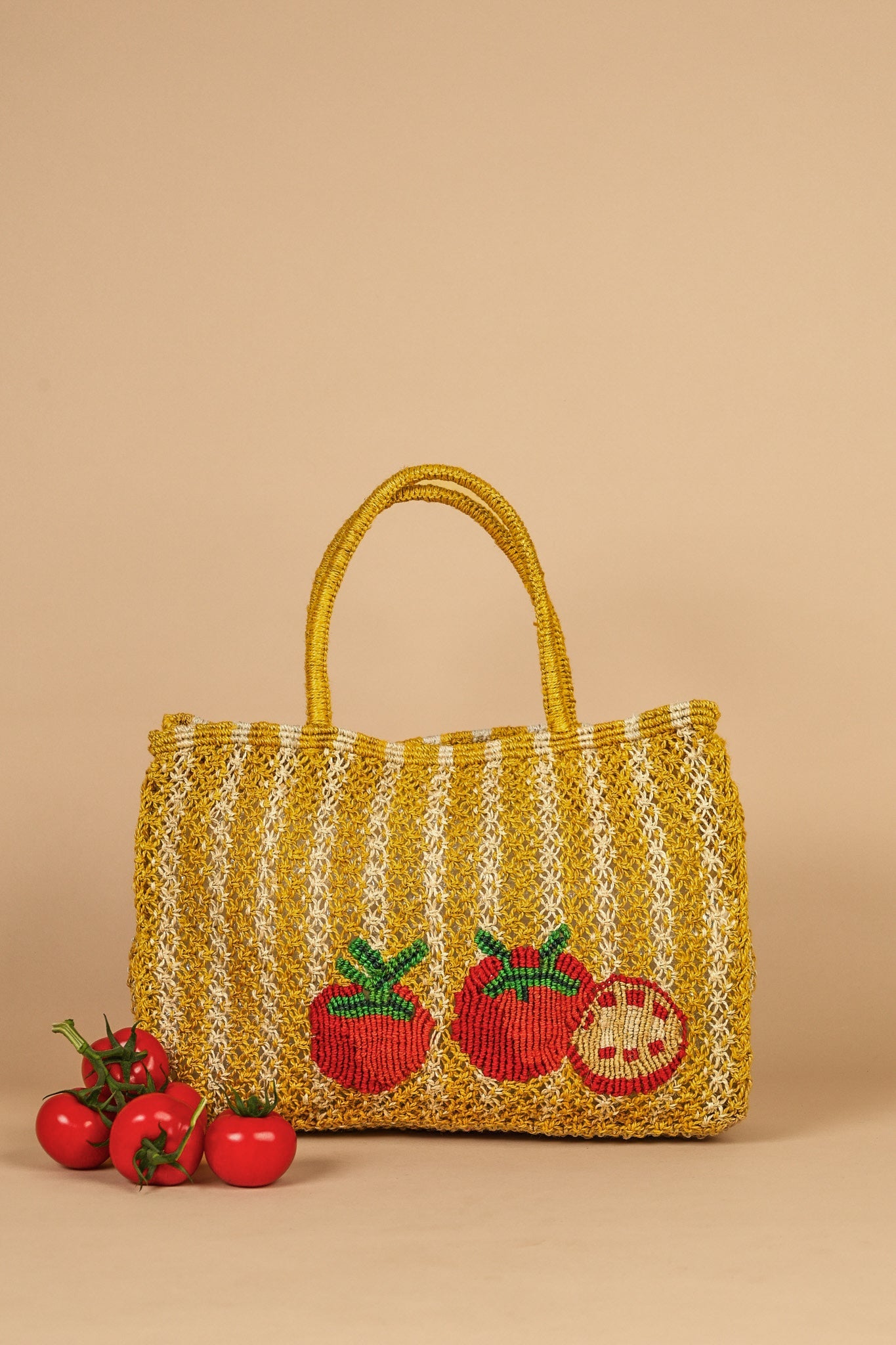 The Jacksons Tomatoes handmade jute tote bag featuring tomato appliqués and yellow striped design. Perfect for markets, beach days, and everyday carry.